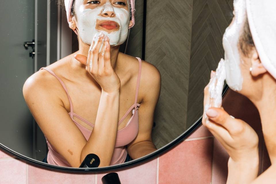 Woman doing skincare as part of a pre-wedding beauty regime