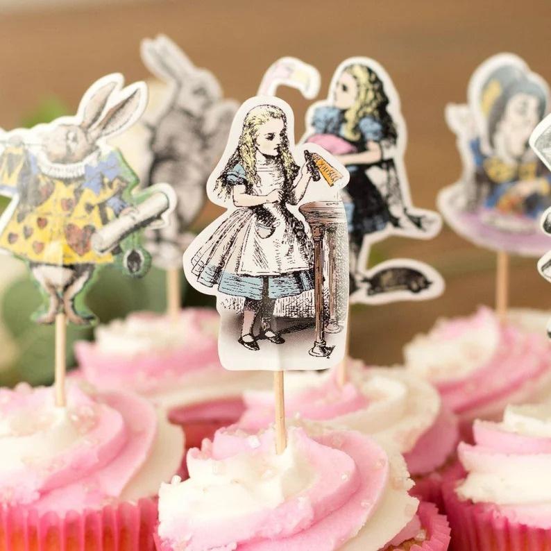 https://cdn0.hitched.co.uk/article/8325/original/1280/jpg/115238-alice-in-wonderland-cake-picks.jpeg