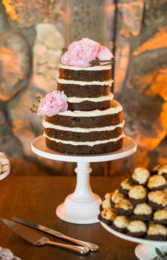 Naked simple wedding cake with peonies