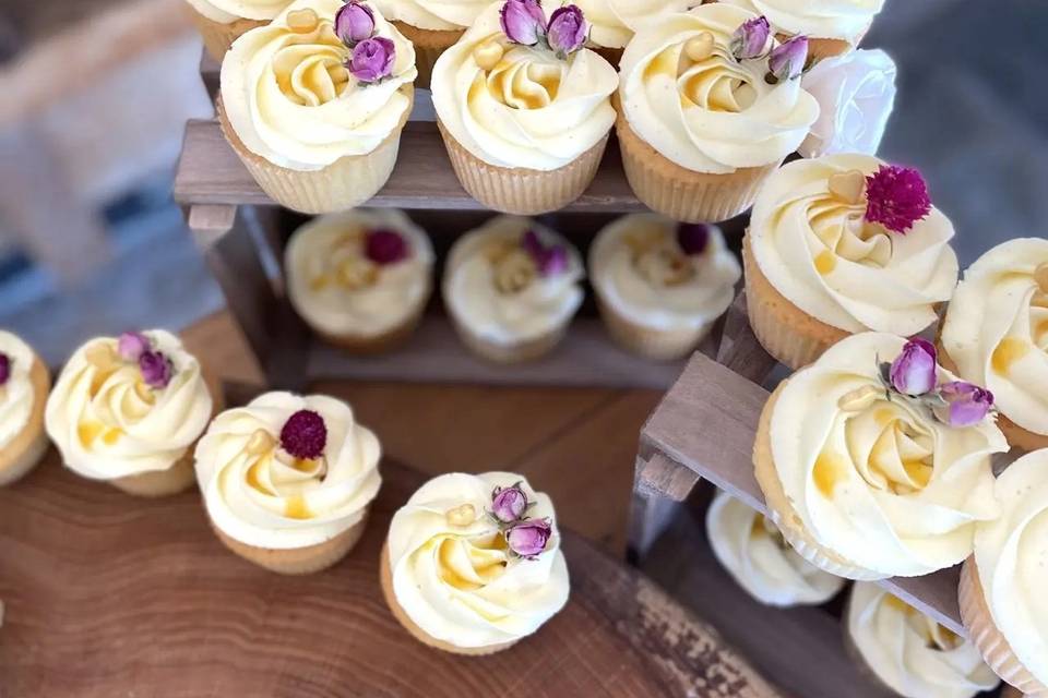 Mini wedding cupcakes decorated with dried flowers