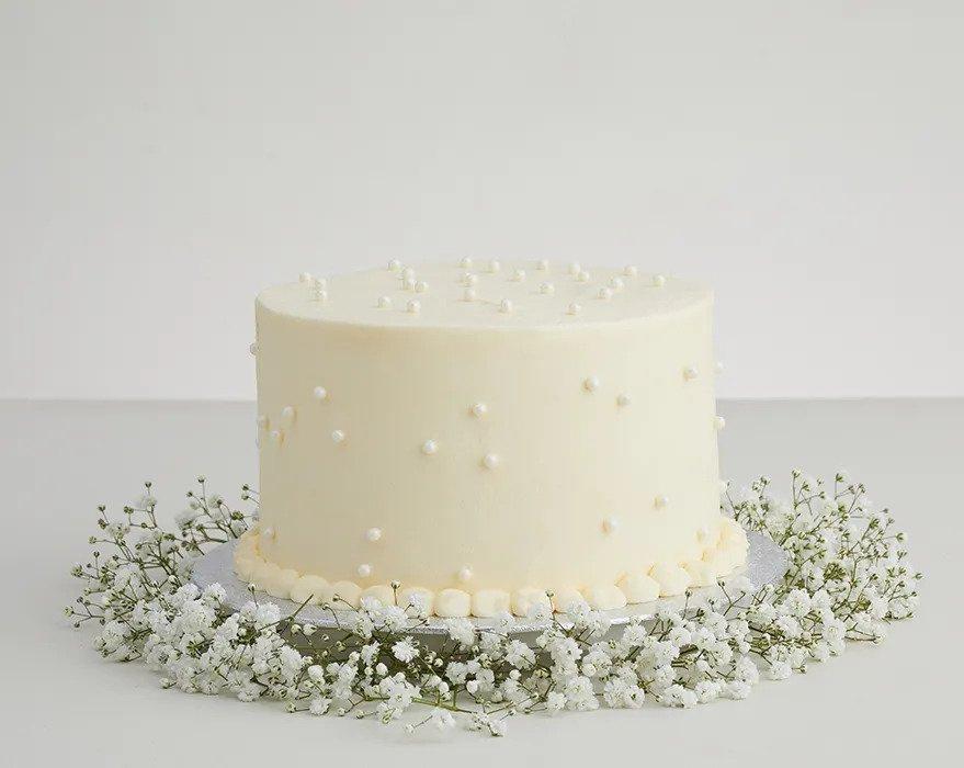 Gold sugar pearls cake  Wedding anniversary cakes, Beautiful wedding cakes,  Simple cake designs