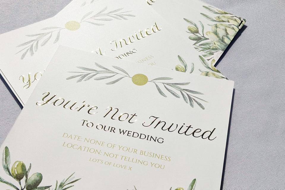wedding invitations that say 'you're not invited to our wedding' on them