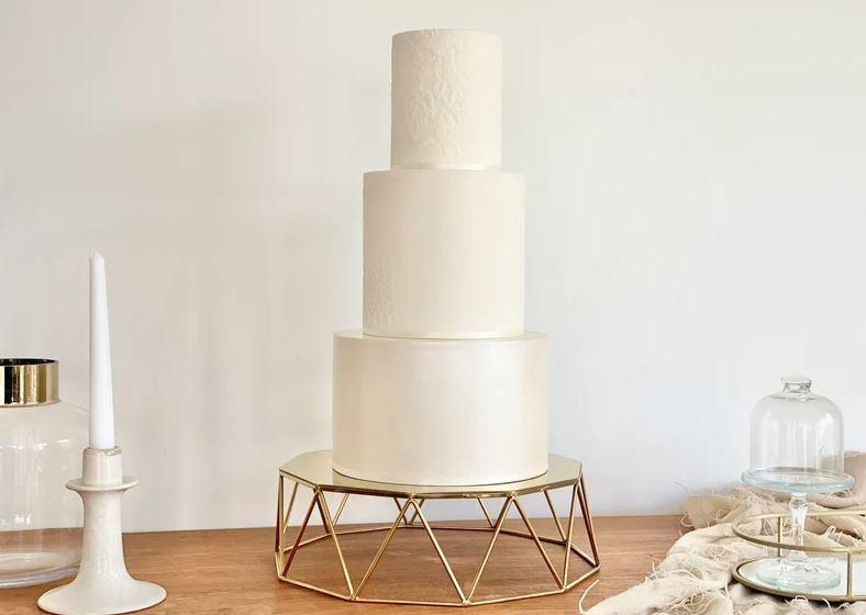 geometric wedding cake stand in gold metal