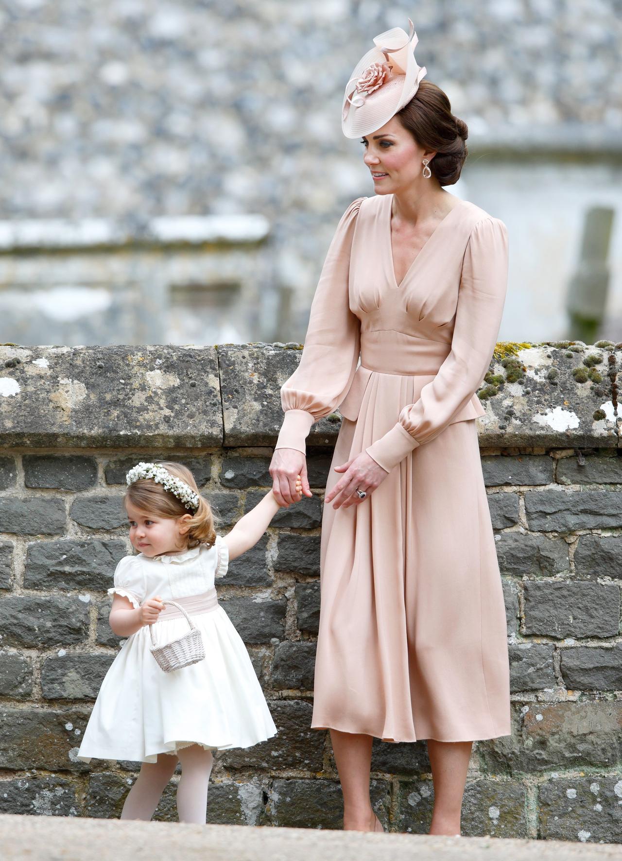 Kate Middleton at Pippa Middleton's wedding with Princess Charlotte