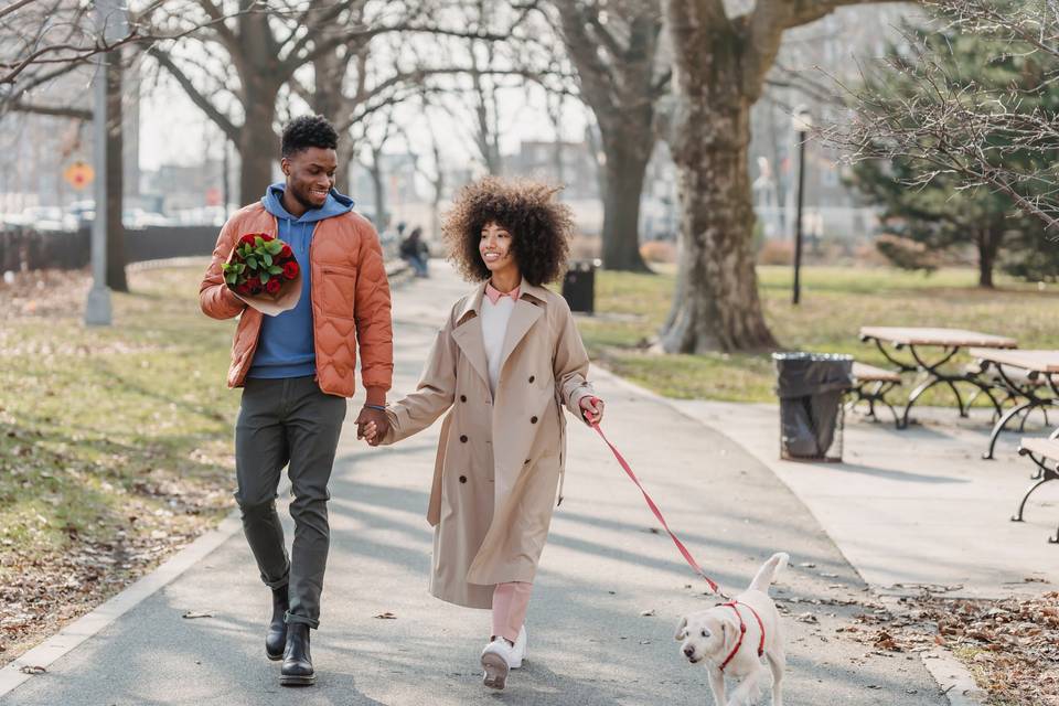Couple on first date walking dog