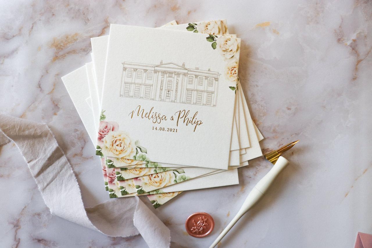 A stack of wedding invitations