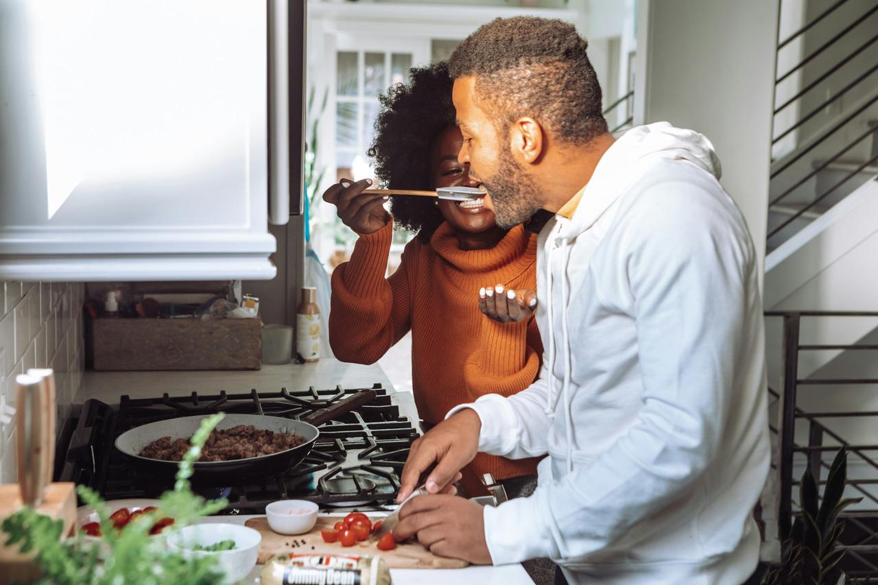 couple cooking together