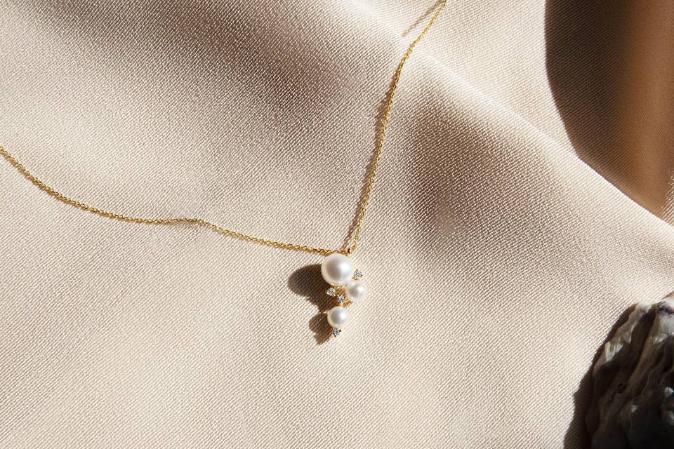 Diamond and pearl cluster necklace by Taylor & Hart