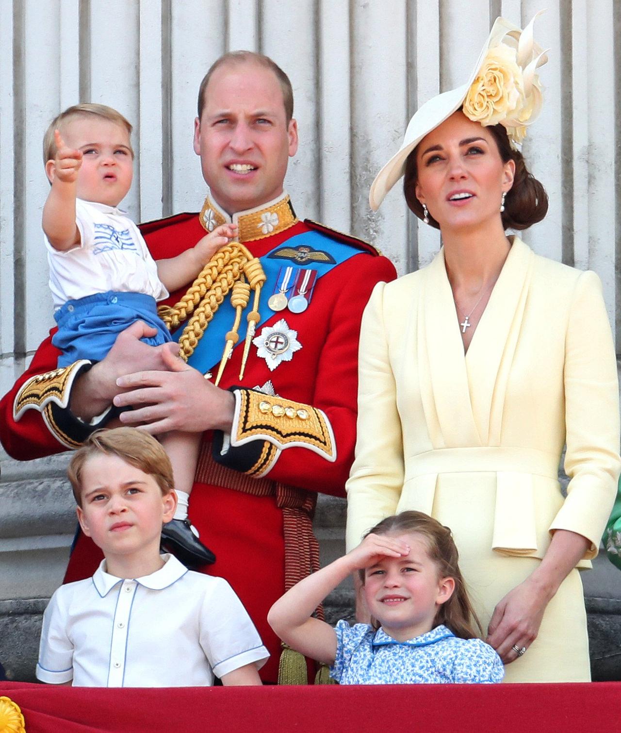Kate Middleton, Prince William and their children watch trooping the colour from a balcony