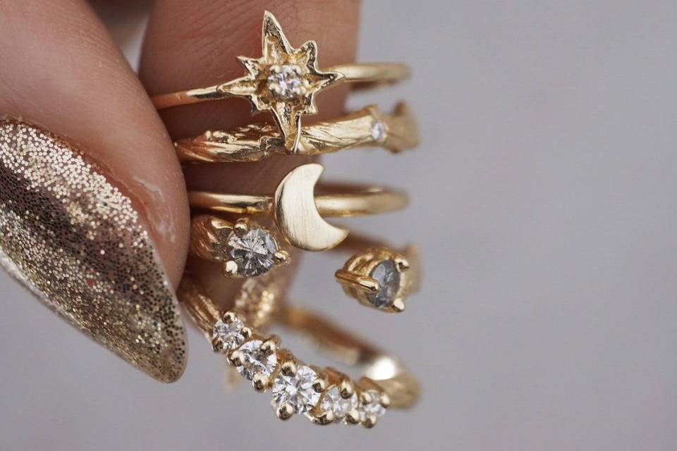 Gold stackable rings with celestial designs