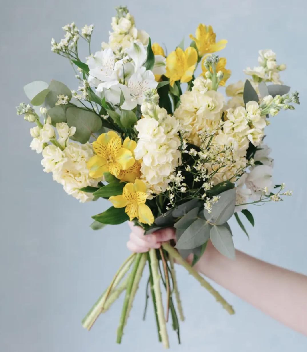 Bunch of classic yellow and cream flowers in the Letterbox Flower Company