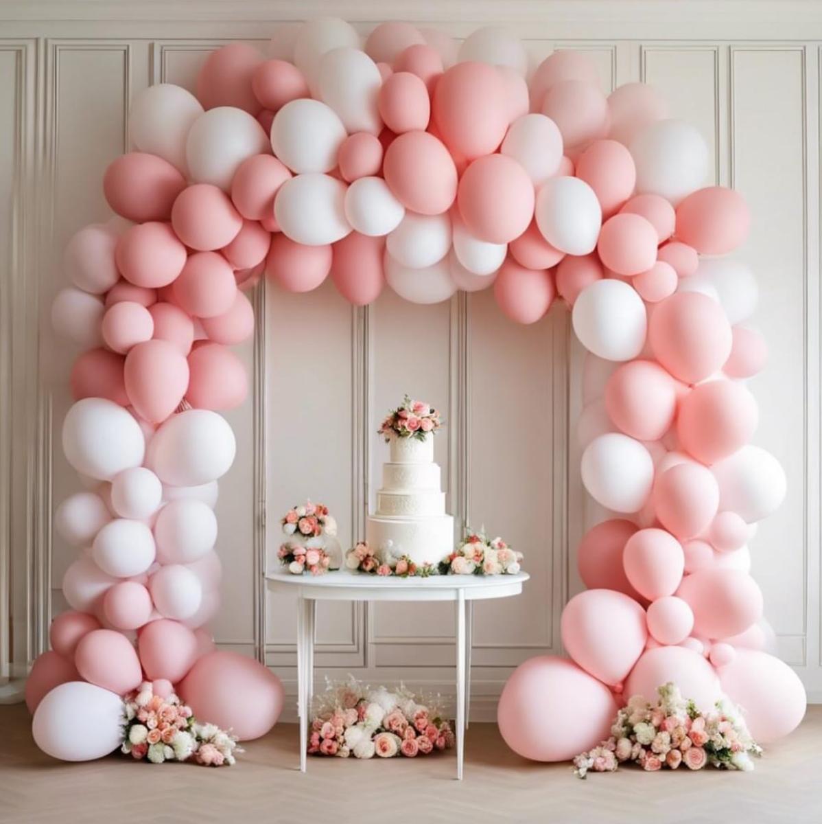 Pink and White Wedding Balloon Arch above cake