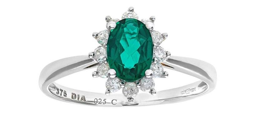 Emerald and diamond cluster engagement ring