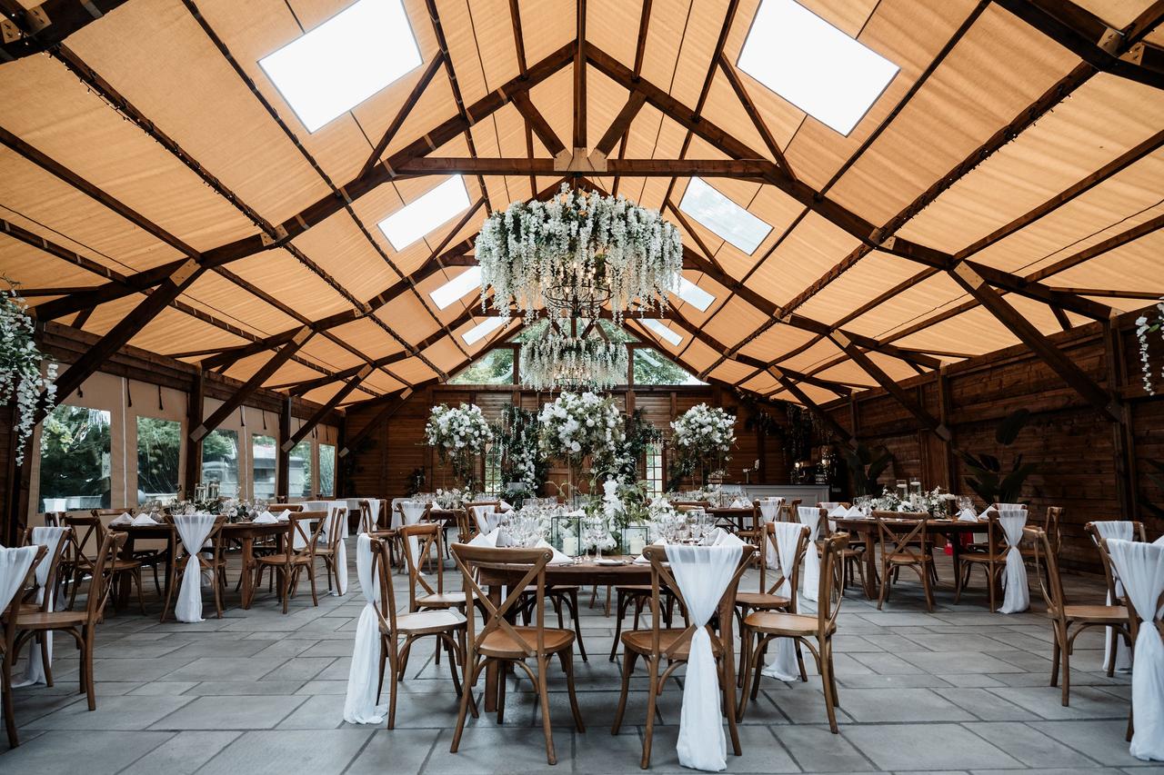 Tipi style marquee with deep mahogany wood sides at Ramside Hall, Durham.
