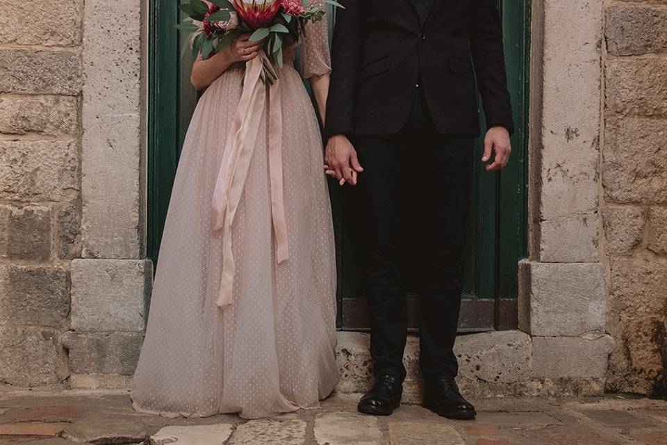 Wedded couple standing in doorway