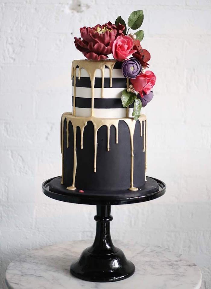 Black drip cake with sprinkles and mini choco bars - FunCakes