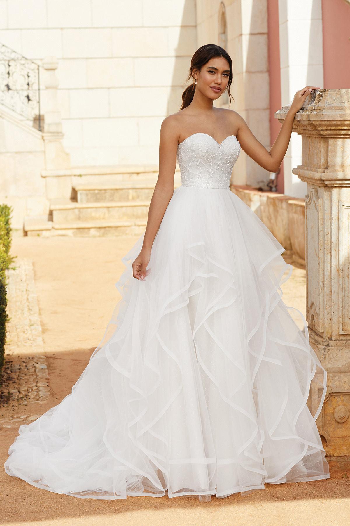 Ruffle Wedding Dresses 17 Statement Styles Hitched co uk Hitched co uk