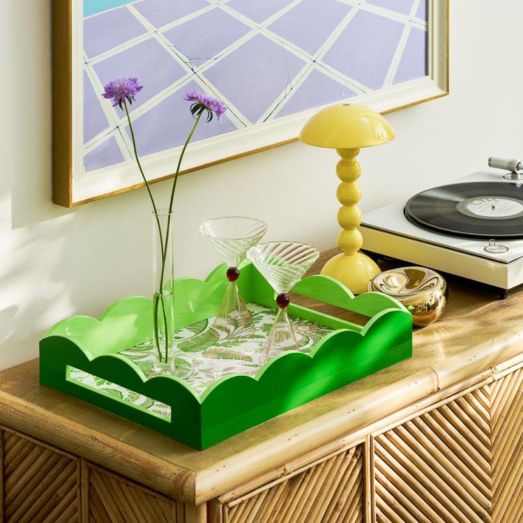 green lacquered tray from Addison Ross on an oak side table