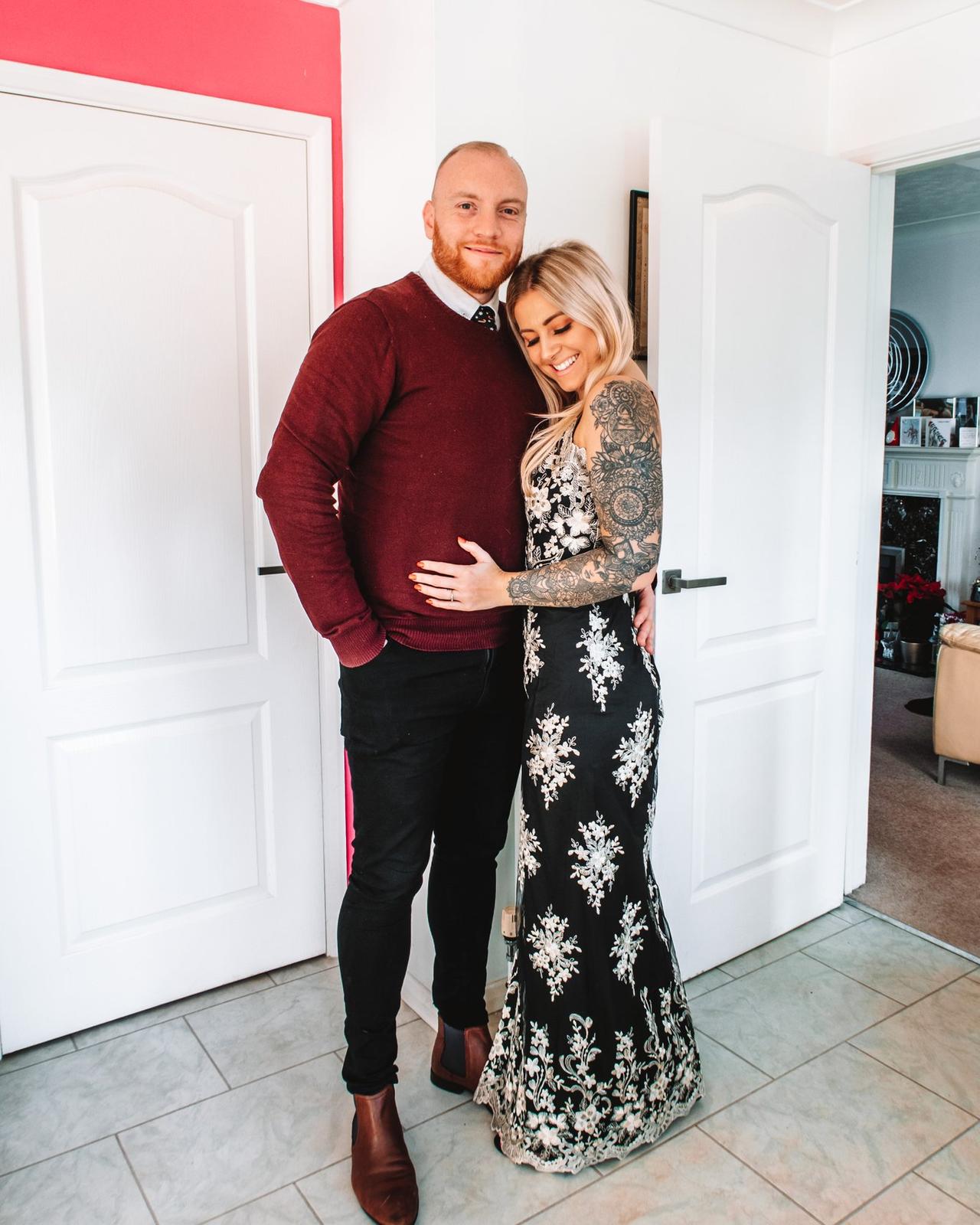 The writer embracing her fiance