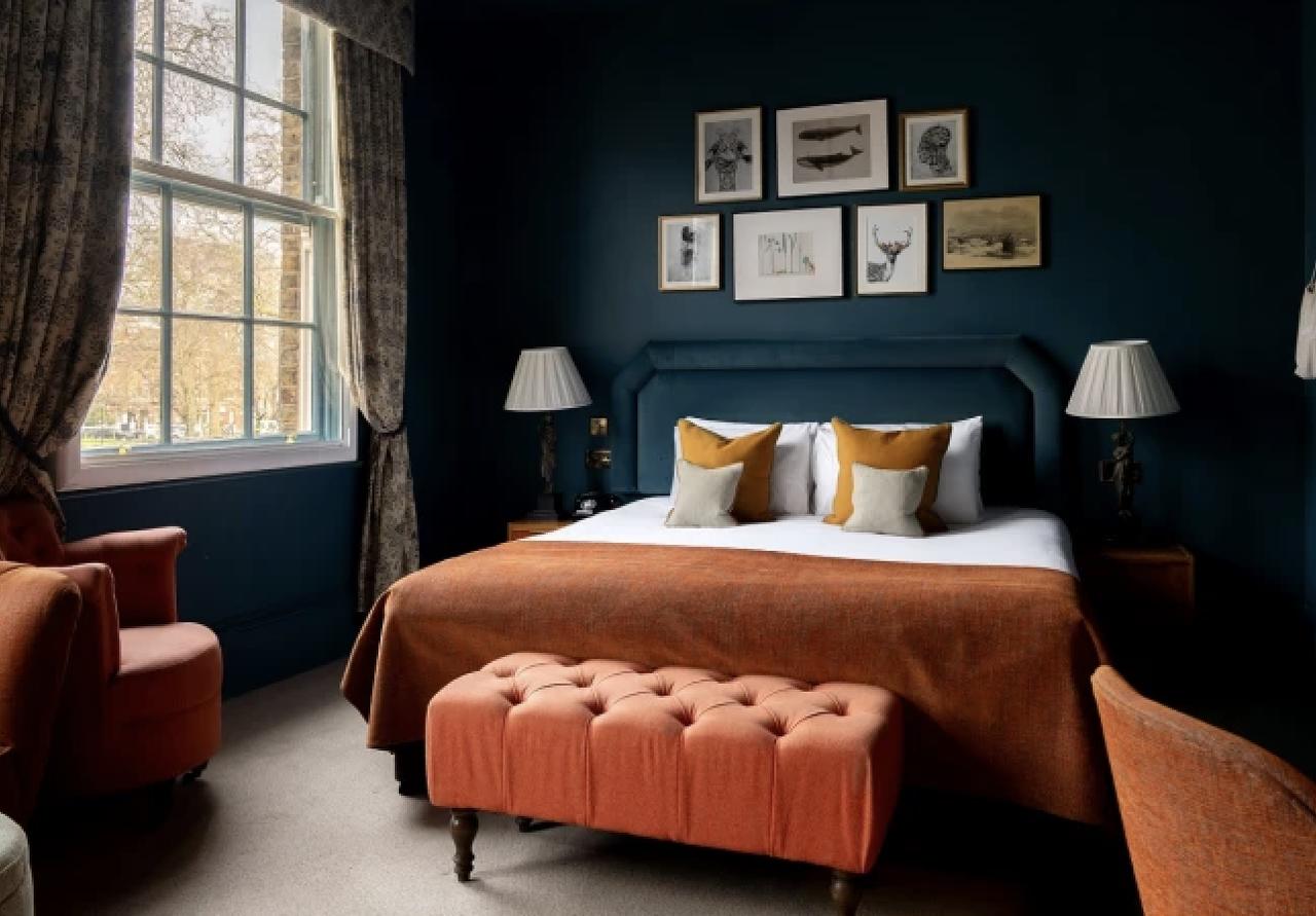 a luxurious, plush double bedroom in Aragon House, a London minimoon hotel spot