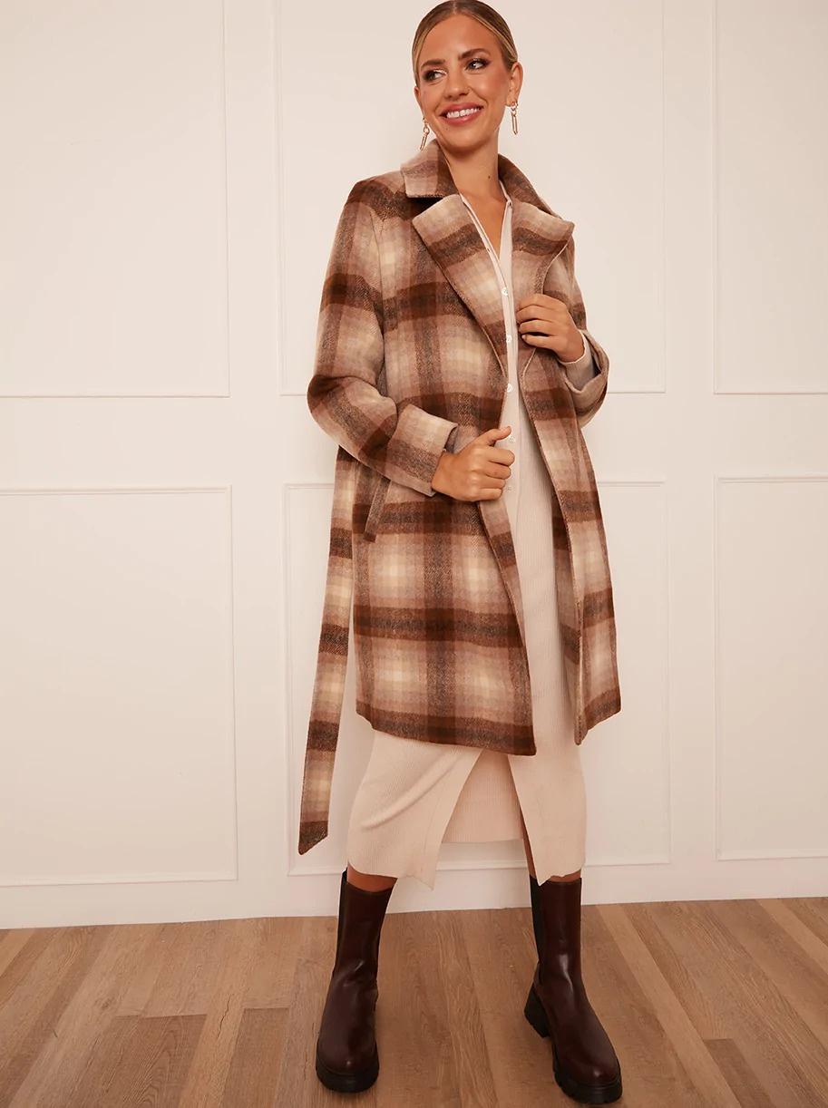 Model wearing a brown check coat