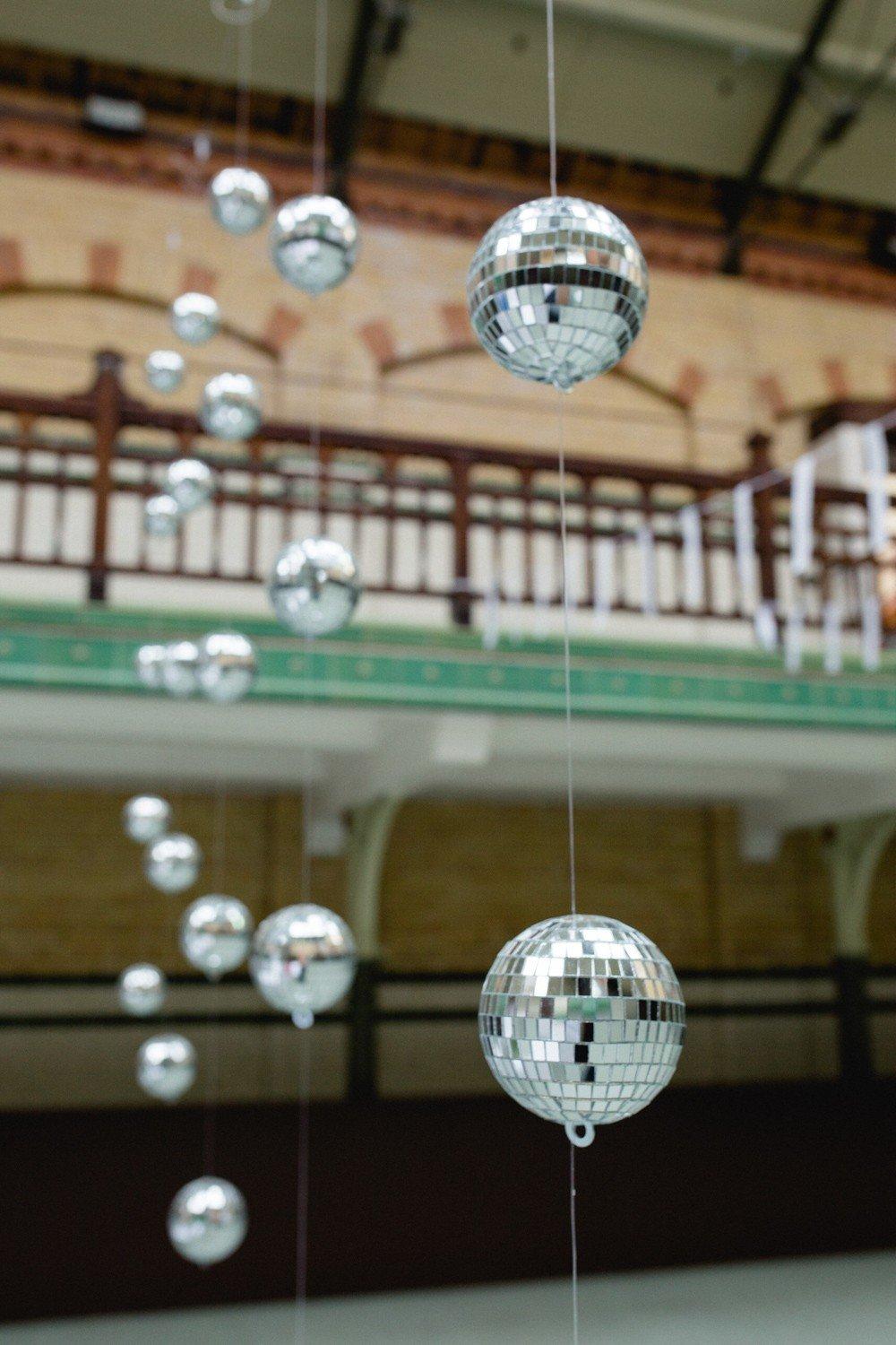 Rent Rotating mini disco balls with lights installed in London