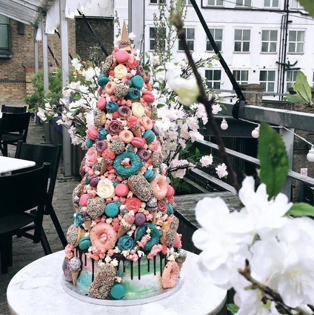 unicorn tower wedding cake with drip base