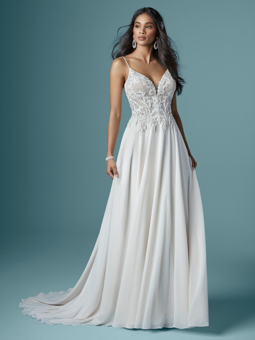 Bride trying wedding dress
