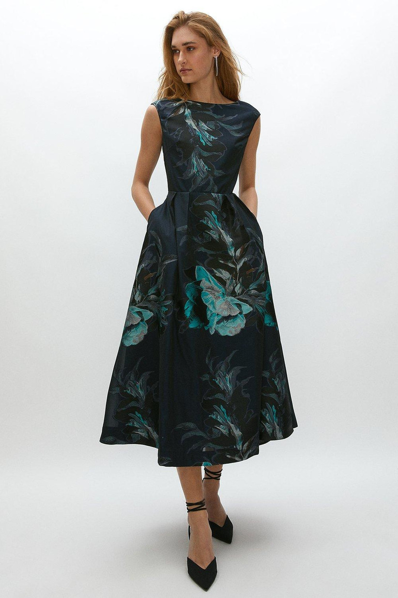 Model wearing a jacquard mother of the groom dress