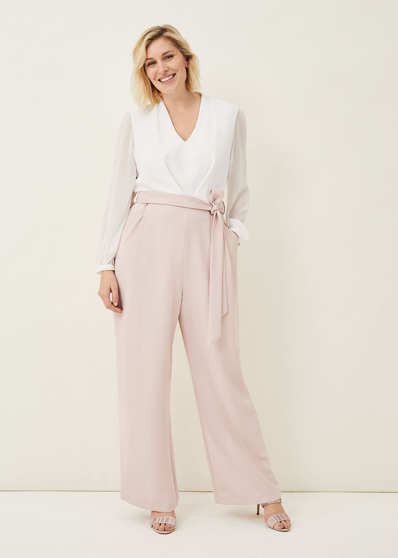 Jumpsuit with white long-sleeve top and pale pink trousers