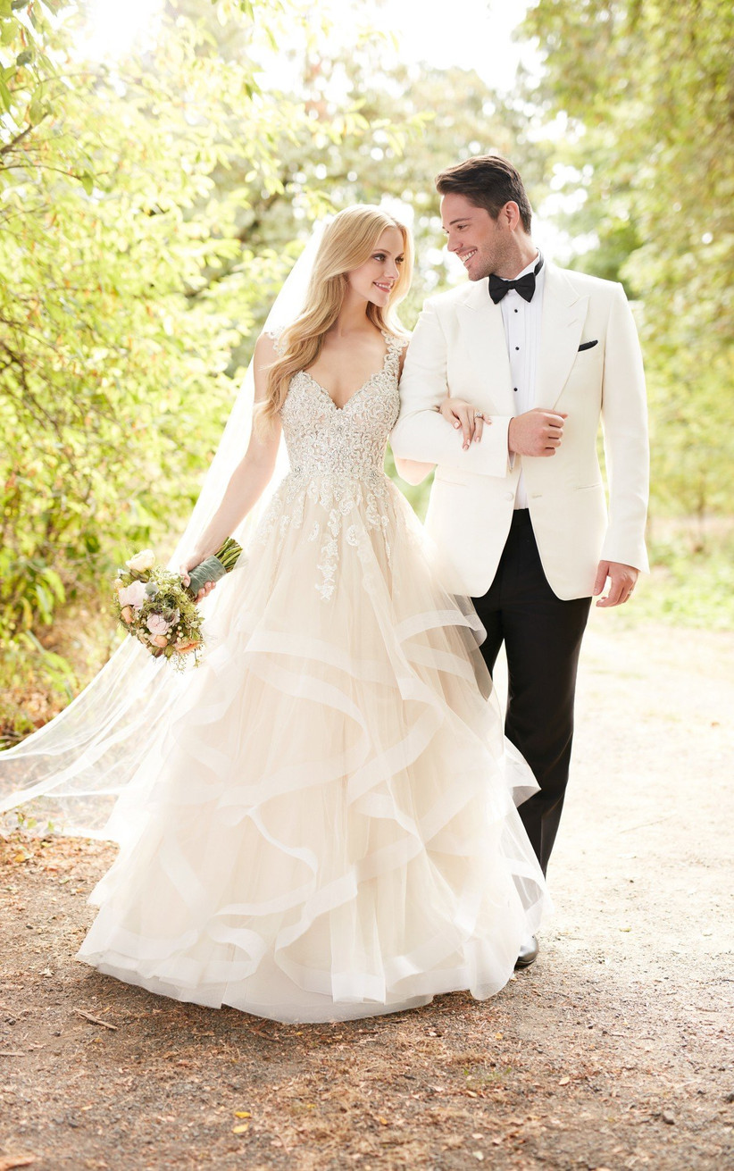 21 Romantic Champagne Wedding Dresses For Brides Who Want Something Different Hitched Co Uk The collection includes elegant trains, chic and chiffon designs, aline and pleated ball gowns, sleeveless and lace sleeves, these wedding dresses are simply perfect for your special day. 21 romantic champagne wedding dresses