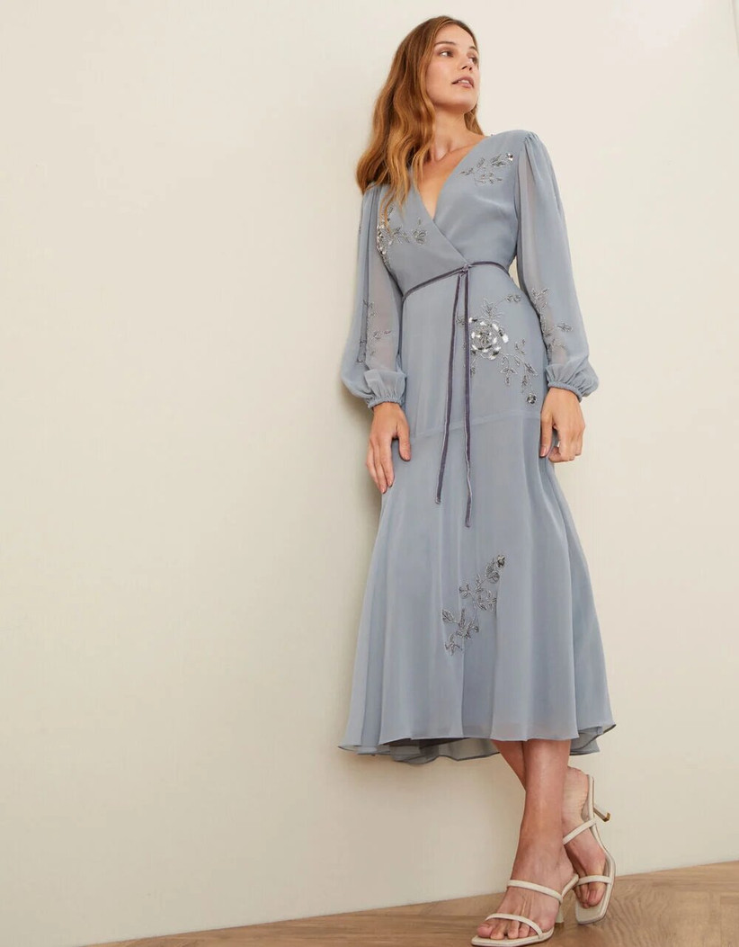 Model wearing a grey mother of the groom wrap dress