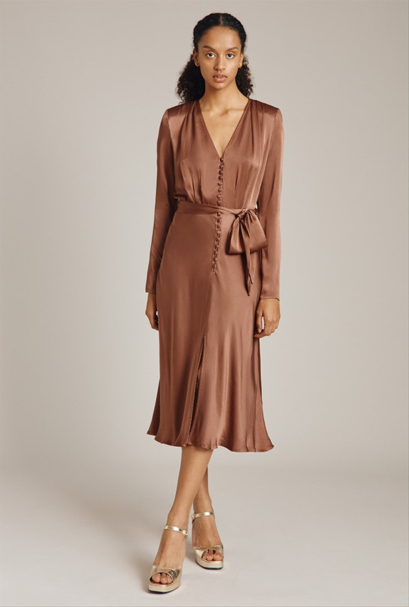 Model wearing a brown mother of the groom dress