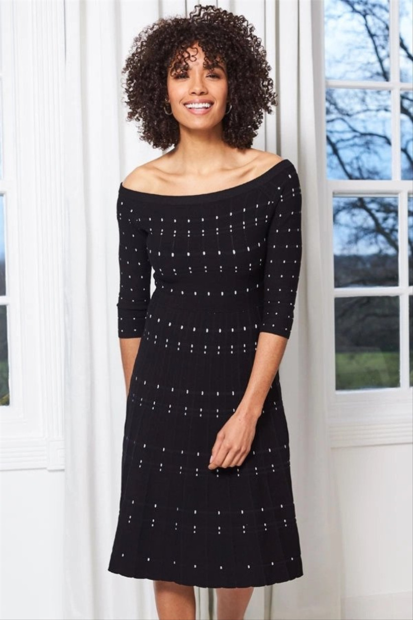 Black dress with white stripes and a Bardot neckline