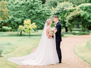 A Pretty, Pink Summer Wedding at Chippenham Park with a Horse-Drawn Carriage and a Stella York Dress