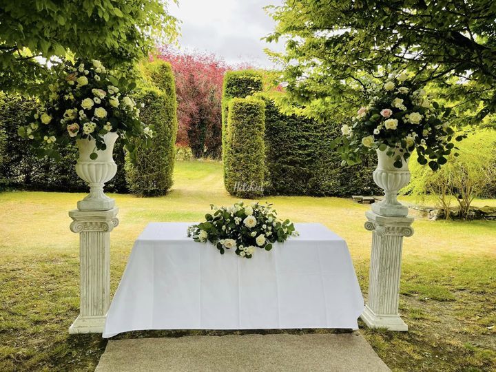 BY ARRANGEMENT FLORIST
