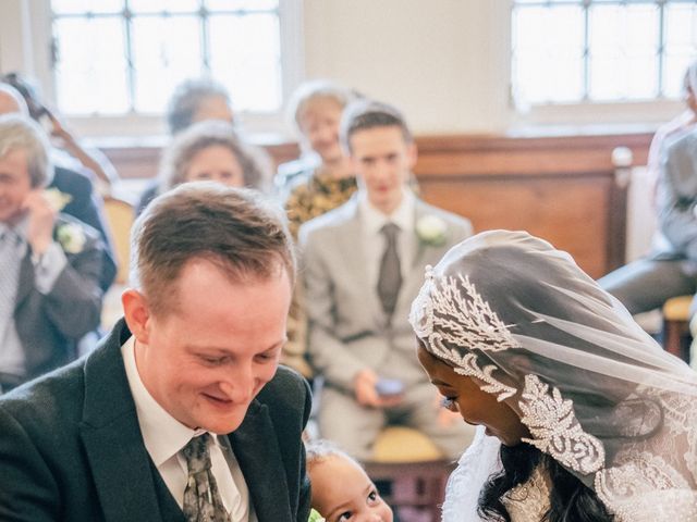 Nathaniel and Adepeju&apos;s Wedding in Sanford On Thames, Oxfordshire 31