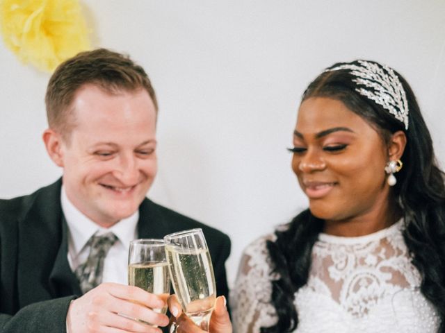 Nathaniel and Adepeju&apos;s Wedding in Sanford On Thames, Oxfordshire 43