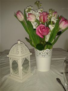 A little flash of ring and table centres