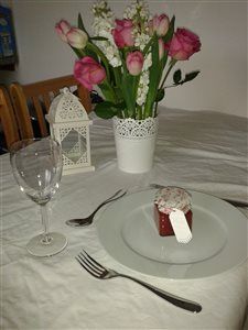 A little flash of ring and table centres