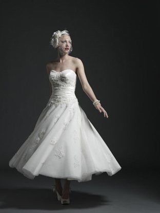 Re: wedding dresses...anybody wanna share what there having?