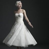 Re: wedding dresses...anybody wanna share what there having?
