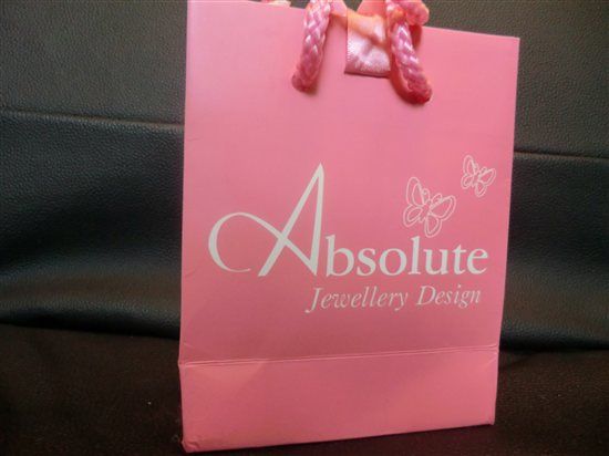 Silver coloured vintage look headpiece for sale. Pearls and Diamantes, flower shaped on comb.