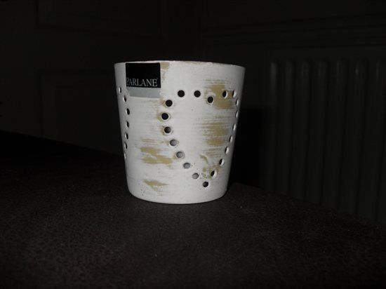 For sale 12 cream tealight holders with hearts on the outside