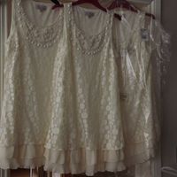 3 bridesmaids dresses and 3 pairs of gold pumps