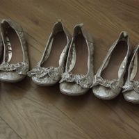 3 bridesmaids dresses and 3 pairs of gold pumps
