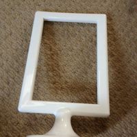 12 clear vases, 6 white table name holders, 8 vintage bucket tealight holders for sale