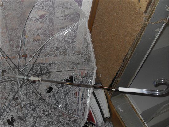 White plastic lace effect umbrella