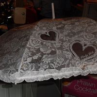 White plastic lace effect umbrella