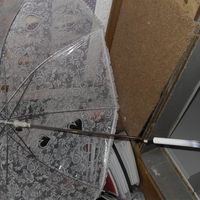 White plastic lace effect umbrella